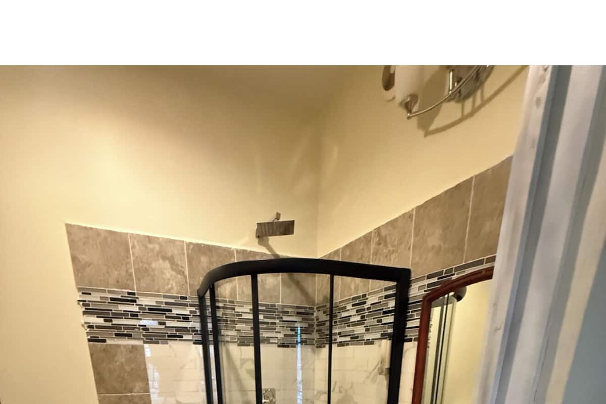 Shower, towels, soap, shampoo