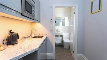 Hair dryer, towels, soap, shampoo
