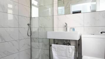 Hair dryer, towels, soap, shampoo