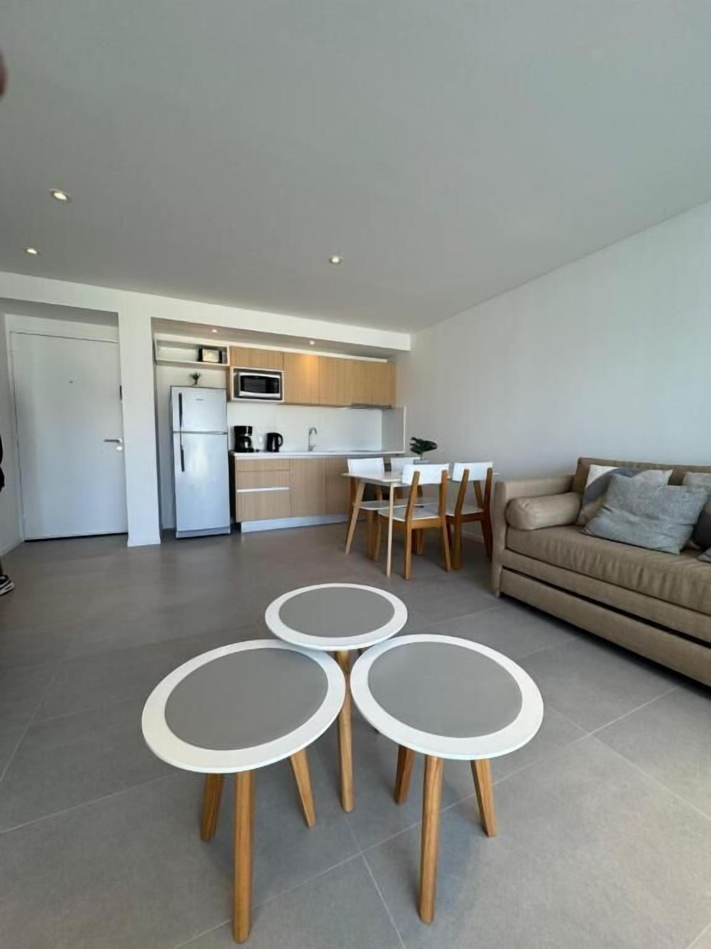 Apartamento conforto, vista para a montanha | Área de estar