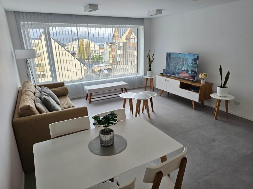 Apartamento conforto, vista para a montanha | Área de estar