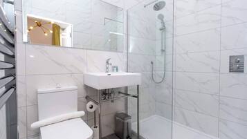 Hair dryer, towels, soap, shampoo