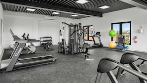 A gym with treadmills, weight machines, and exercise balls. - 5-Min Drive to Eagle Beach|Large Patio|Pool&Jacuzzi (Noord)