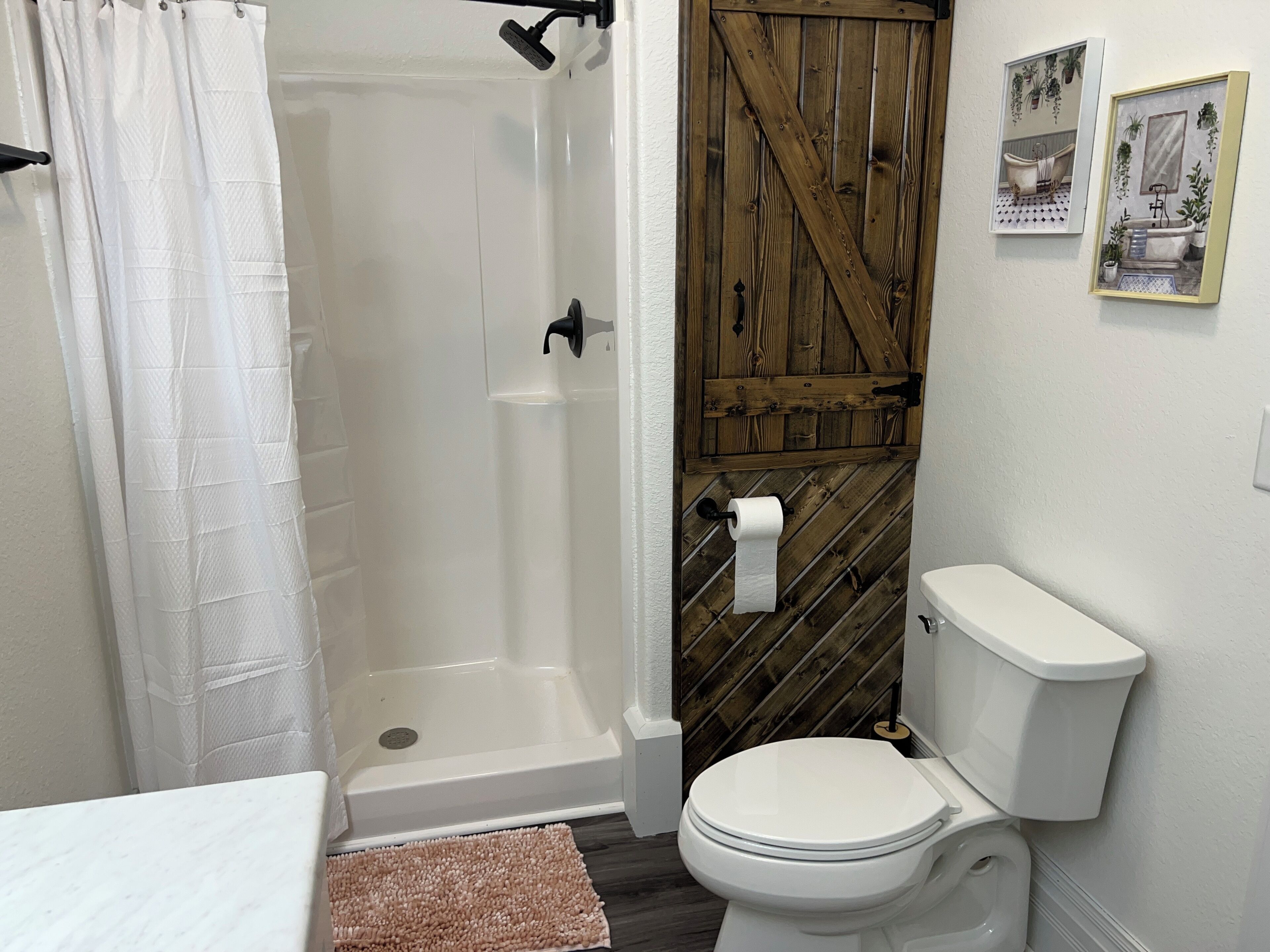 Shower, jetted bath, towels, soap