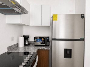 Private kitchen - Garden Urban Stay | Pool | 15 min from the Historic Center (San Marcos)
