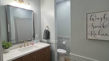Hair dryer, towels, soap, toilet paper