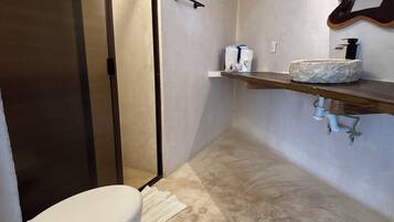 Shower, towels, soap, shampoo