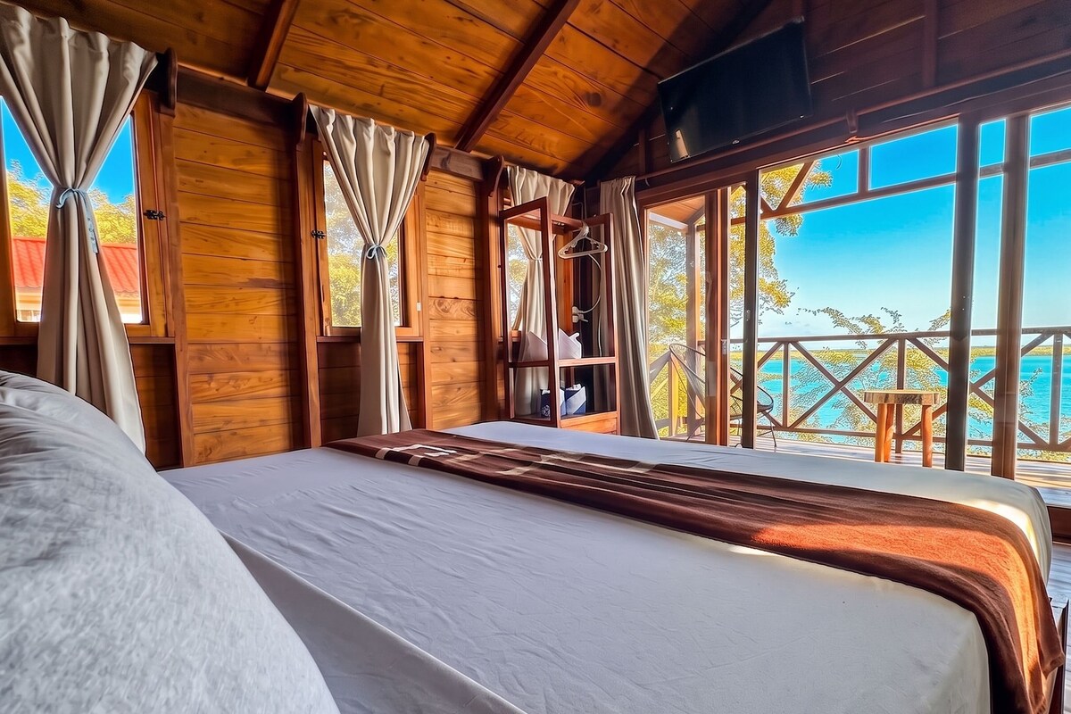 Panoramic Bungalow, 1 King Bed, Terrace, Lagoon View | Free minibar, free WiFi, bed sheets