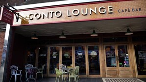A building with a sign reading 'CONTO LOUNGE CAFE BAR'. - #139 Large coastal apartment near Beach|sleeps 10 (Bournemouth)