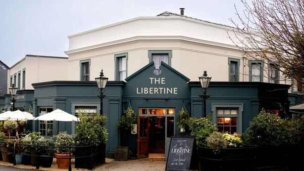 A building with a sign reading 'THE LIBERTINE' at the entrance. - #141 Coastal Apartment BournemouthBeach| Sleeps 10 (Bournemouth)