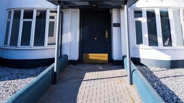 A modern building with a curved facade, multiple windows, and a central entrance. - #150 Bright Apt – Westbourne Area - Sleeps 7 (Bournemouth)