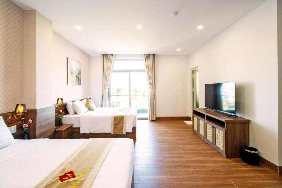 Chambre Familiale, vue ville | Wi-Fi gratuit