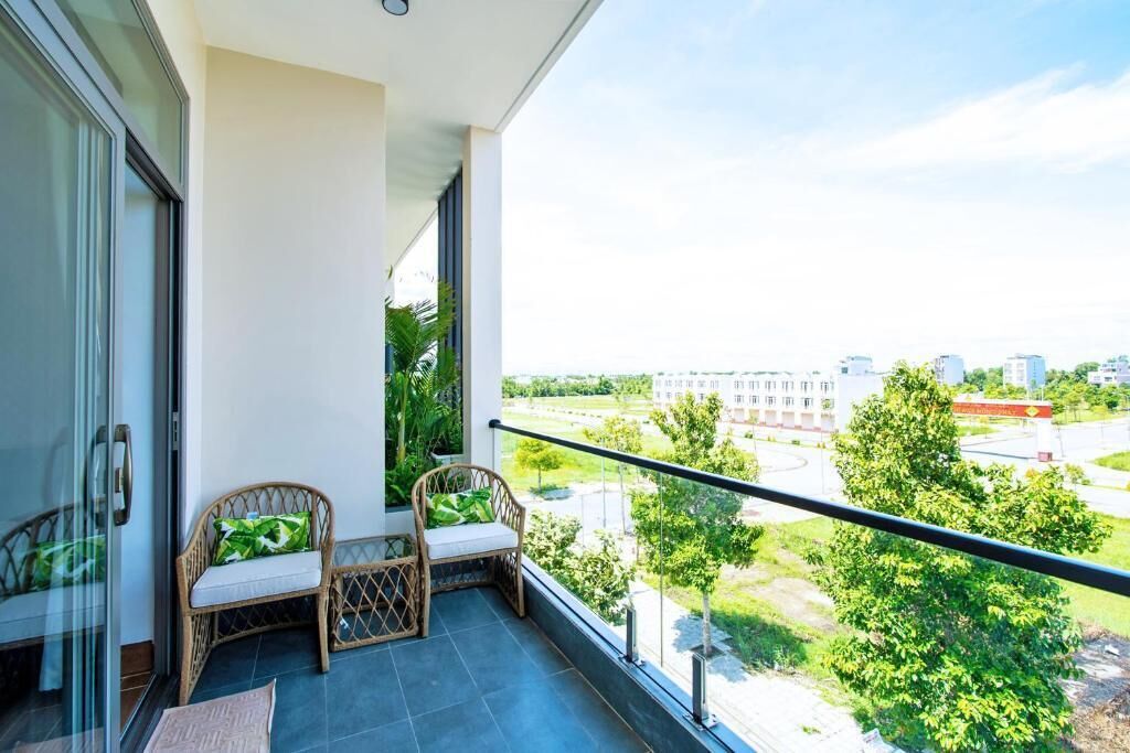 Habitación cuádruple familiar, vistas a la ciudad | Jardines del alojamiento