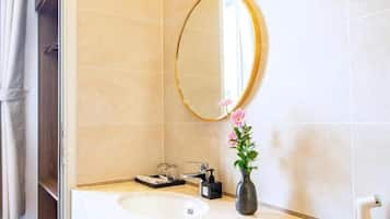 Family Room, City View | Bathroom | Shower, slippers, soap, shampoo