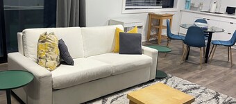 Spacious private bedroom with ensuite and living room with separate entrance