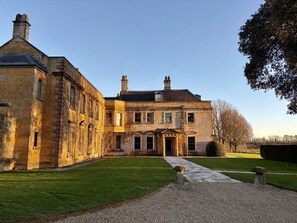 A large, historic building with a symmetrical facade, multiple windows, and a central entrance. - Ashclose Lodge Annexe -  Sherborne, Dorset (Sherborne)