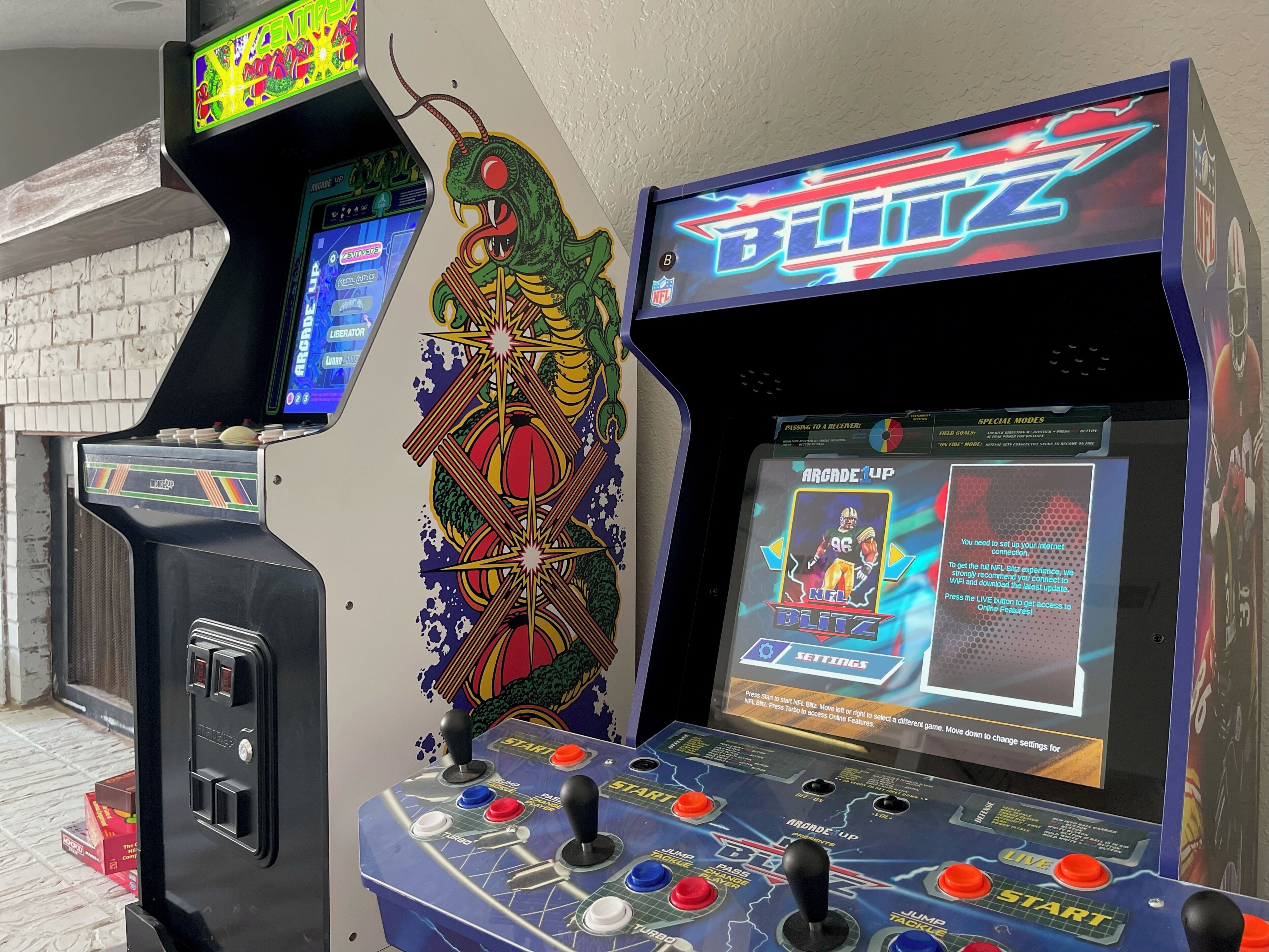 An arcade machine with a colorful design and multiple control buttons.