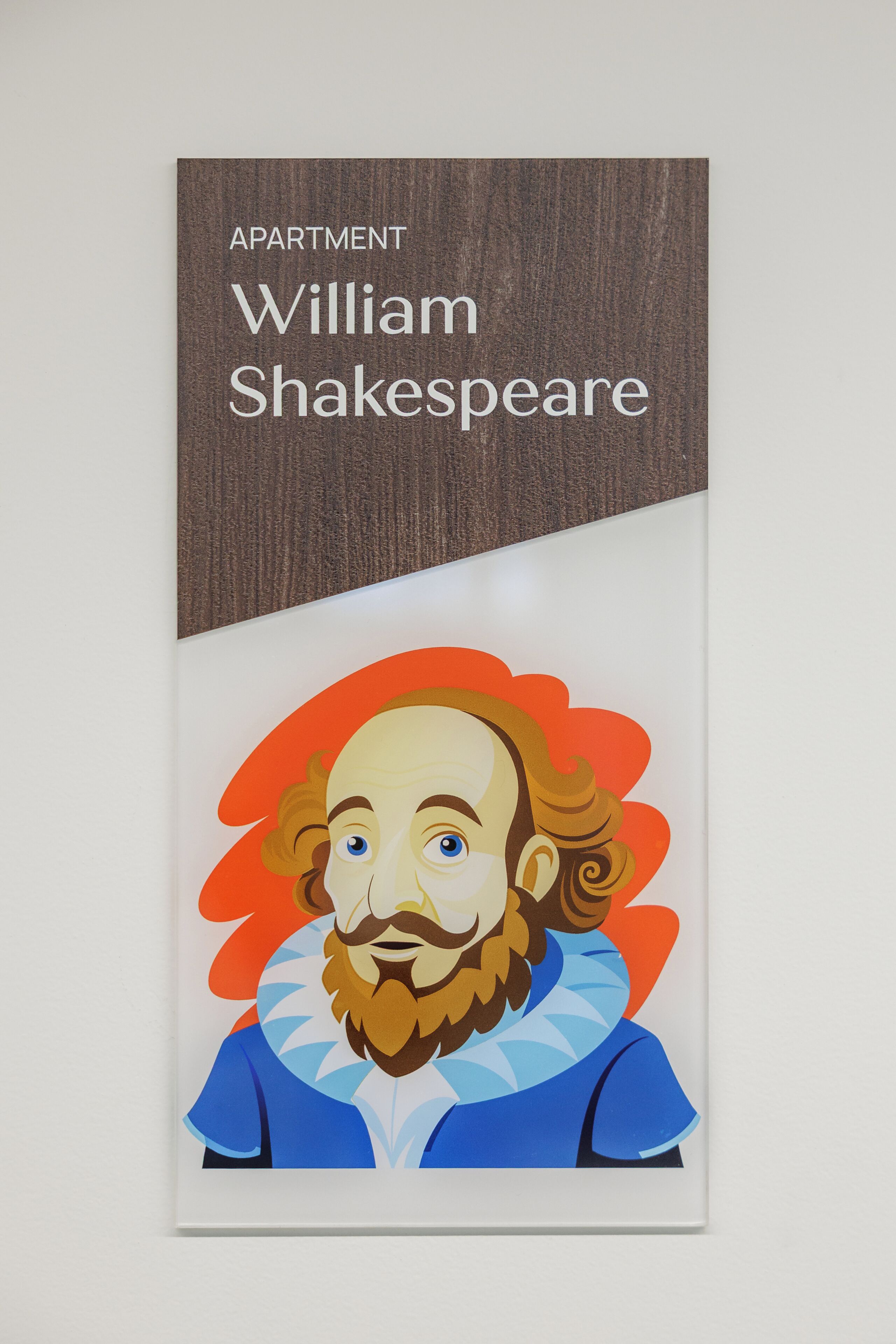 A book titled 'William Shakespeare' with a graphic of a man on the cover.