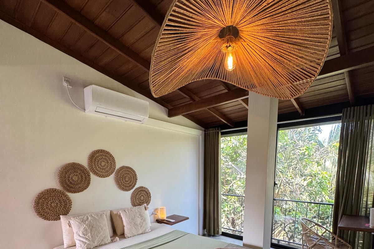 ห้องดีลักซ์ดับเบิลหรือทวิน, วิวสวน | โต๊ะทำงาน, พื้นที่ทำงานแบบใช้แล็ปท็อป, Wi-Fi ฟรี, ผ้าปูที่นอน
