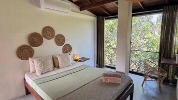 Deluxe Double or Twin Room, Garden View | Desk, laptop workspace, WiFi (free), bed sheets