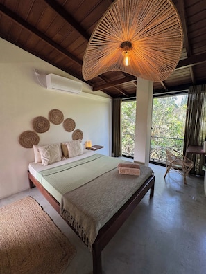 ห้องดีลักซ์ดับเบิลหรือทวิน, วิวสวน | โต๊ะทำงาน, พื้นที่ทำงานแบบใช้แล็ปท็อป, Wi-Fi ฟรี, ผ้าปูที่นอน