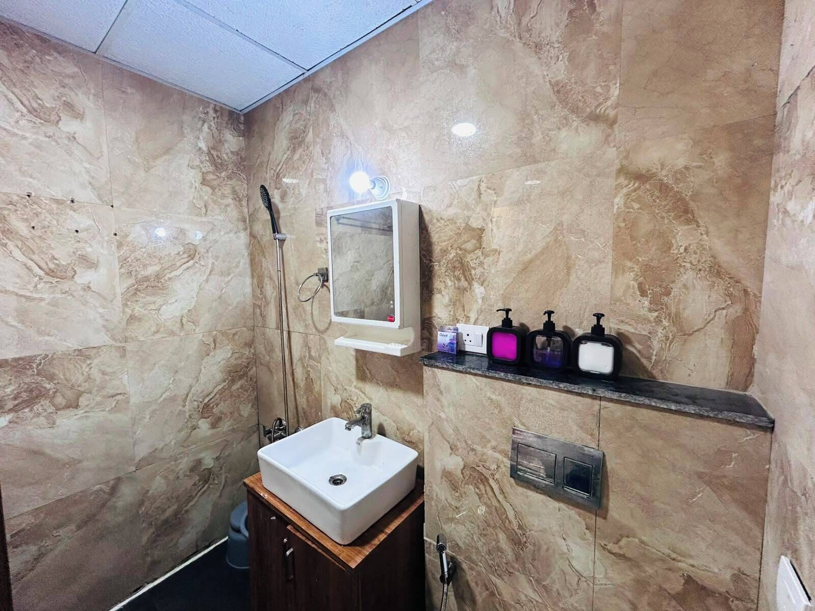 Shower, bidet, towels, soap