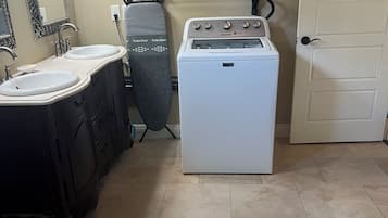 Jetted tub, hair dryer, towels, soap
