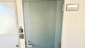 A door with a key lock, a handle, and a number plate indicating room 413. - Raku Osaka Daikokucho Namba Shinsaibashi (Osaka)