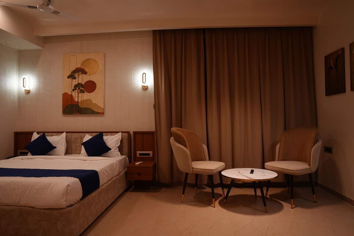Habitación Deluxe | Camas extra, wifi gratis y ropa de cama 