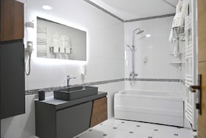 Deluxe Double Room, City View | Bathroom | Shower, hair dryer, towels, soap - Juna's Hotel  (Prizren)