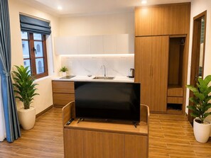 Apartamento família, vista para a cidade | Parte interna