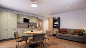 A modern kitchen with a dining area, a sofa, and a bookshelf. - Apartment 3 North East - no balcony (Bad Reichenhall)