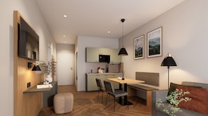 A modern kitchen with a microwave, a dining area with a table and chairs, and a living area with a sofa and a lamp. - Apartment 2 Southwest - Balcony (Bad Reichenhall)