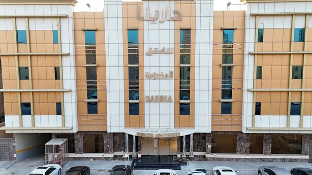 A building with a sign indicating 'Serviced Apartments' and the name 'DARINA' in Arabic. - Darina Serviced Apartments2 (Riyadh)