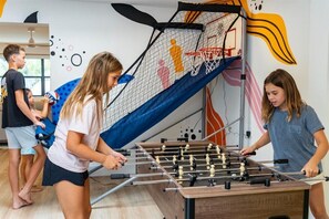 Apparently you cant spin in Foosball  - Resort-style 5BR/3BA home, 8 min to Anna Maria Island. Private heated pool, splash pad, home theater, arcade, pickleball court, sauna & hot tub — sleeps 18 with a boat-themed bunk room kids love. Everything your group needs, right at home. (Bradenton)