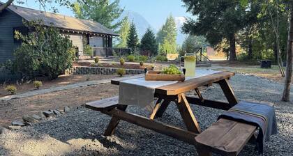 A peaceful mountain retreat less than 1 mile from downtown Packwood. Wake up to Mount Rainier views, relax in the cedar sauna, gather around the fire pit, and watch elk, deer, and wild turkeys wander through the property.