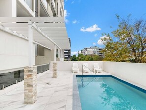 Comfort Apartment, Balcony | Pool | Outdoor pool - Timi Property (Woolloongabba)