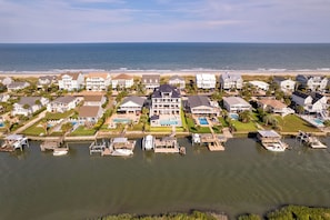 A coastal residential area with houses, a marina, and a beach. - Best Of Both Worlds: Views, Pool, Location & Luxury (Murrells Inlet)