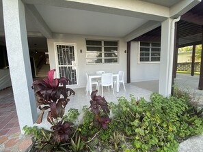Outdoor dining - Cozy 2-bedroom apartment in serene Brighton with AC (Bridgetown)