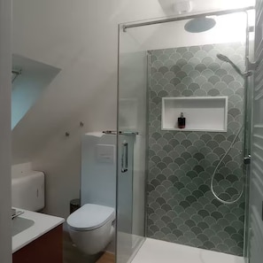 Shower, hair dryer, towels, soap