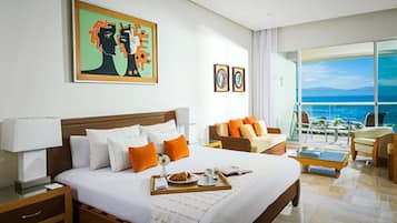 Suite Deluks, balkon, pemandangan kebun | Brankas, tirai kedap cahaya, dan Wi-Fi gratis
