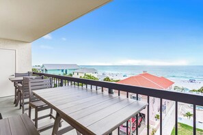 A balcony with a view of the beach and ocean. - Top Floor Gulf Front • Pool • Sand Castle North 503 (Indian Rocks Beach)