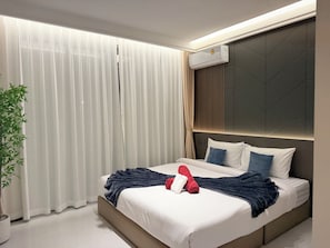 Ferros/tábuas de passar roupa, acesso à internet, roupa de cama