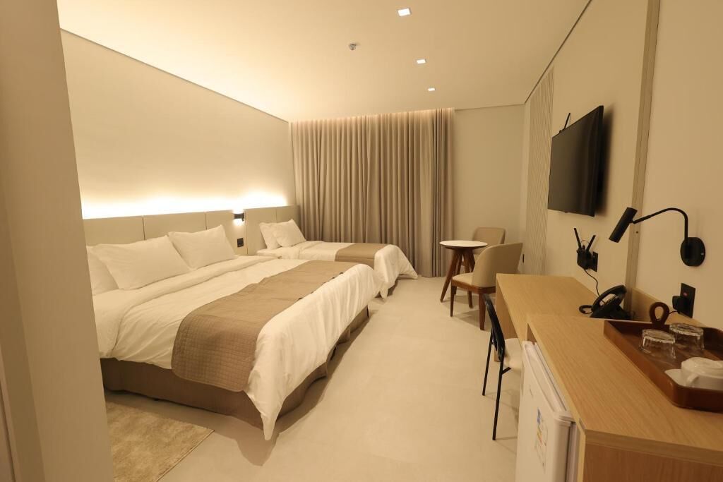 Quarto triplo superior, vista para a cidade