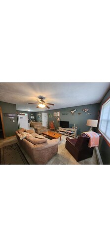 Cozy 2-bedroom, 1-bath cabin just a short walk to Pinckneyville City Lake.