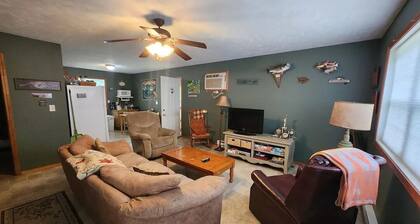 Cozy 2-bedroom, 1-bath cabin just a short walk to Pinckneyville City Lake.