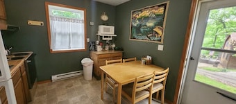 Cozy 2-bedroom, 1-bath cabin just a short walk to Pinckneyville City Lake.