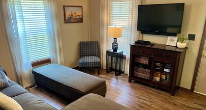 Charming 3-bedroom cabin with easy lake access, huge back deck and fun extras!