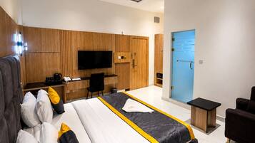 Premium bedding, desk, laptop workspace, free WiFi