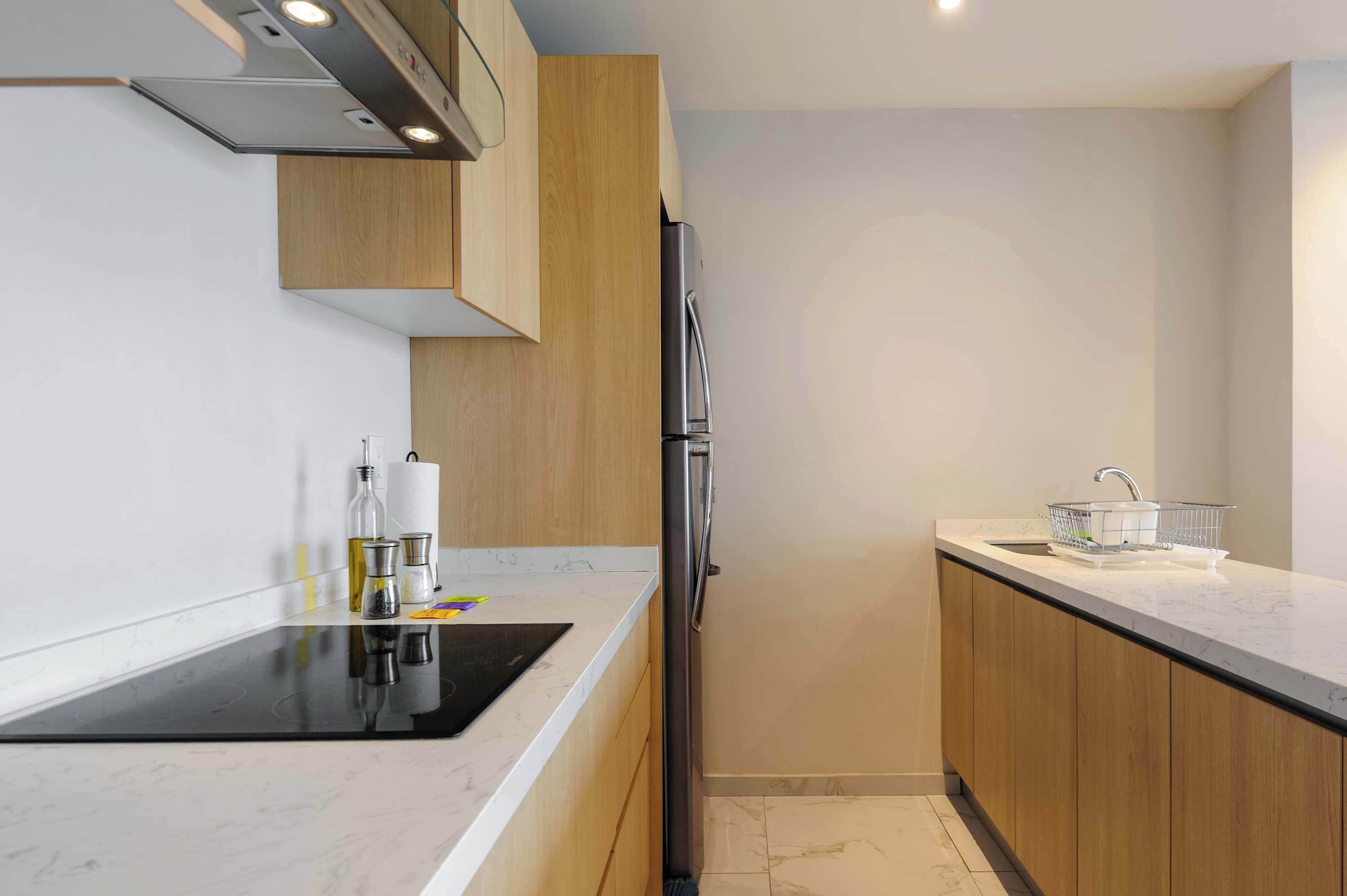 Apartamento | Cozinha privada | Talheres/pratos/utensílios de cozinha